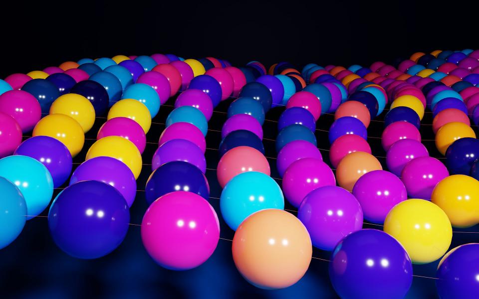 A collection of pastel colored billiard balls